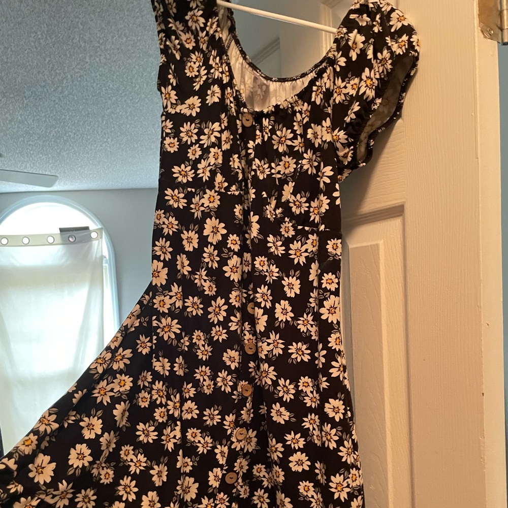 A black dress with sunflowers
